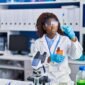 african american woman scientist holding test tube laboratory 85x85